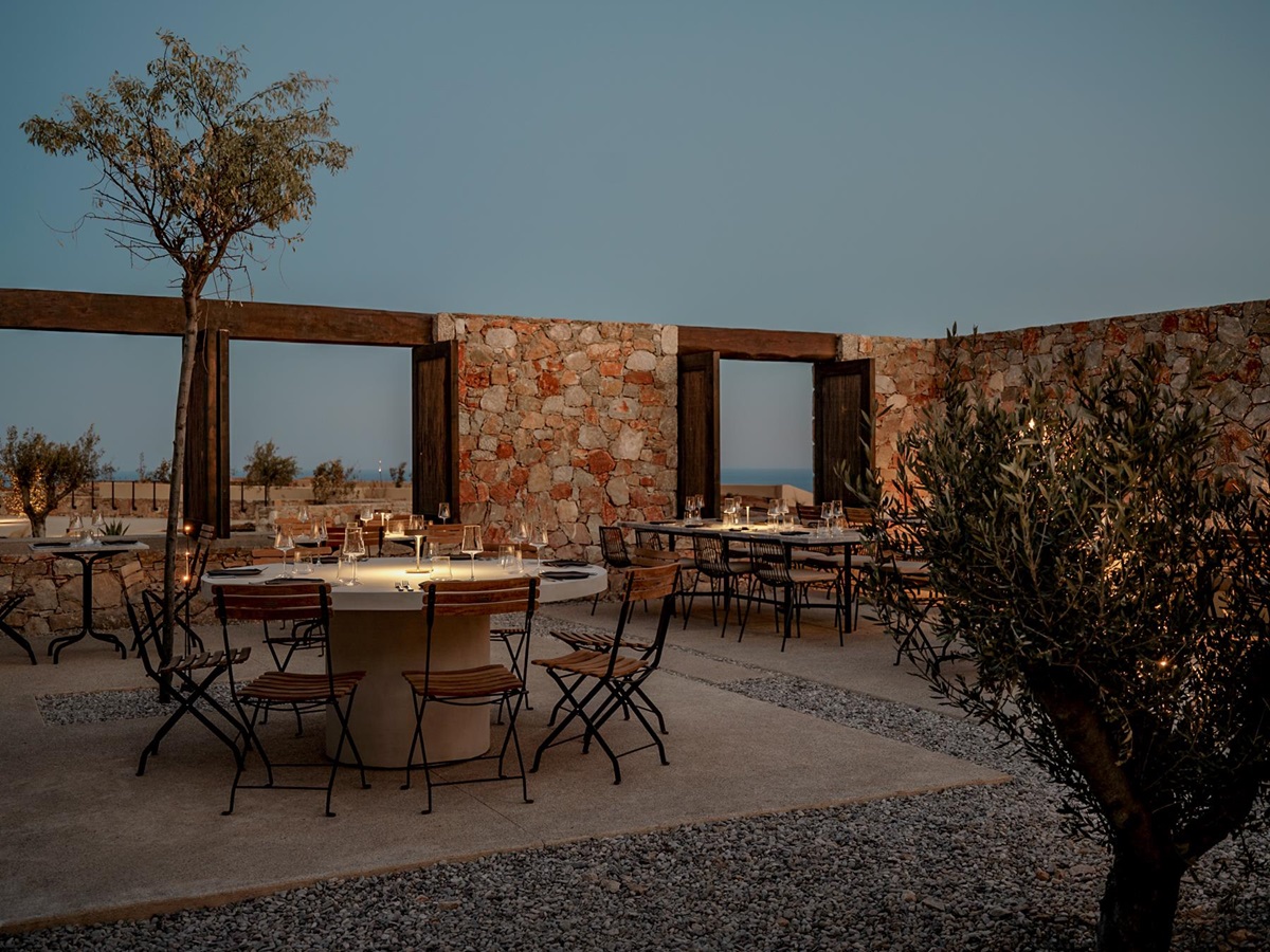 Alfresco dining tables at Gundari luxury resort restaurant in Greece