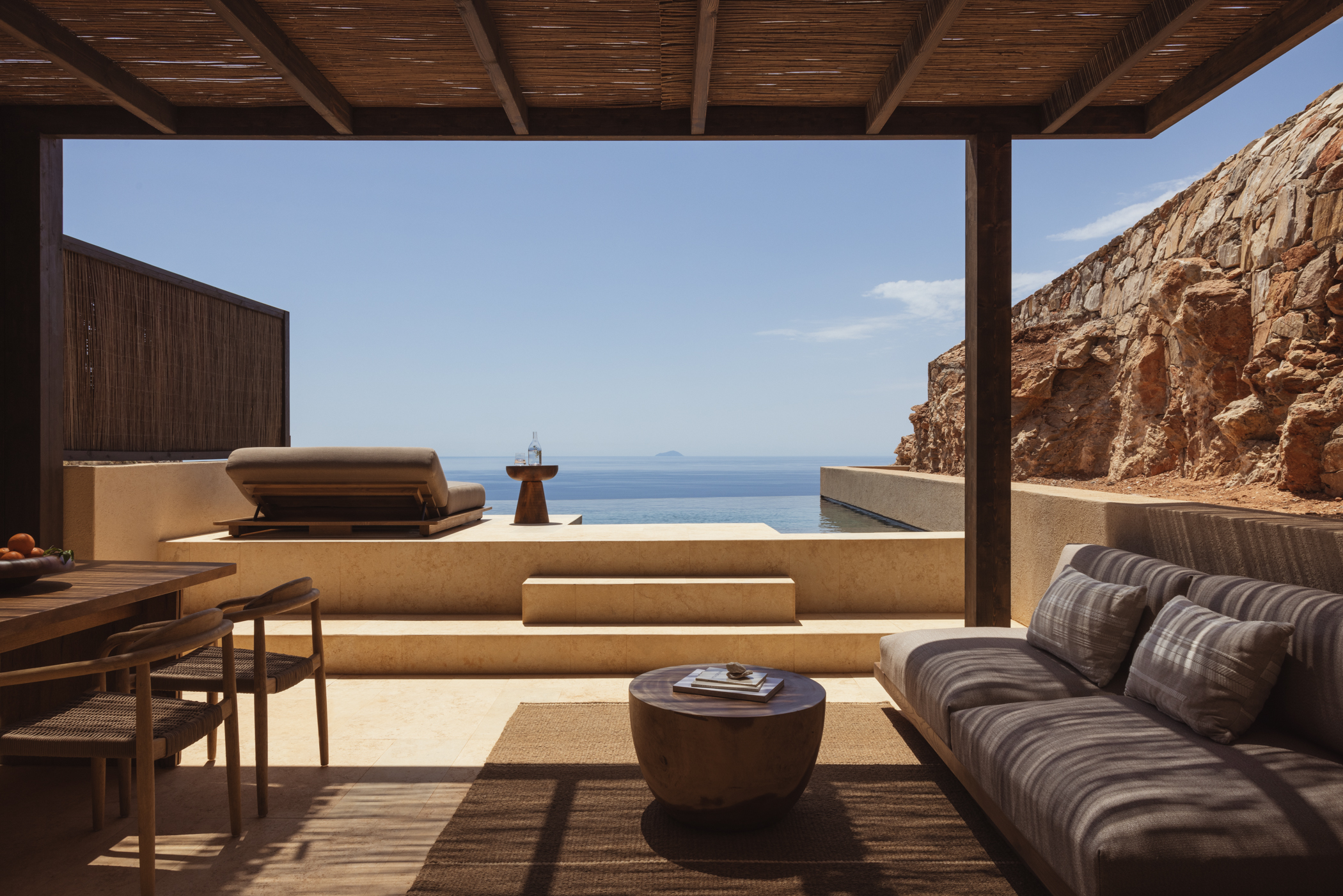 Guest suite terrace with ocean views at Gundari luxury resort in Greece