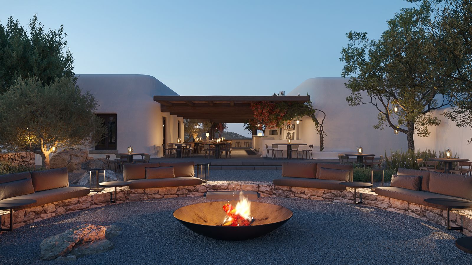 Fire pit at sunset at Kalesma Mykonos