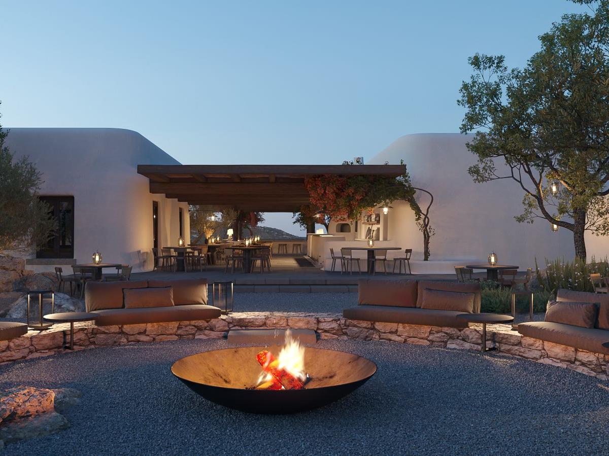 Fire pit at sunset at Kalesma Mykonos