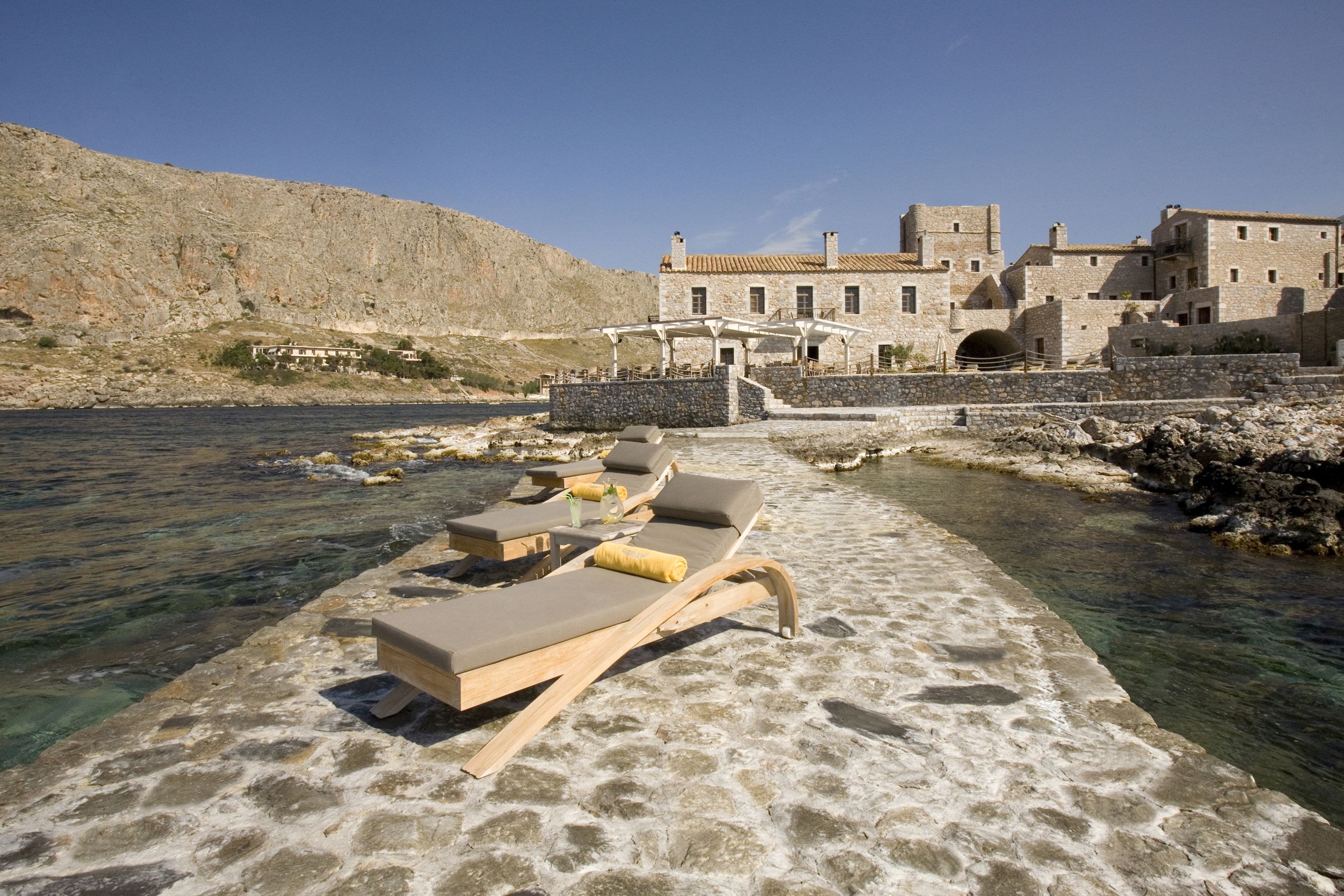 The exteriors and sun loungers at the sea side of Kyrimai, Greece