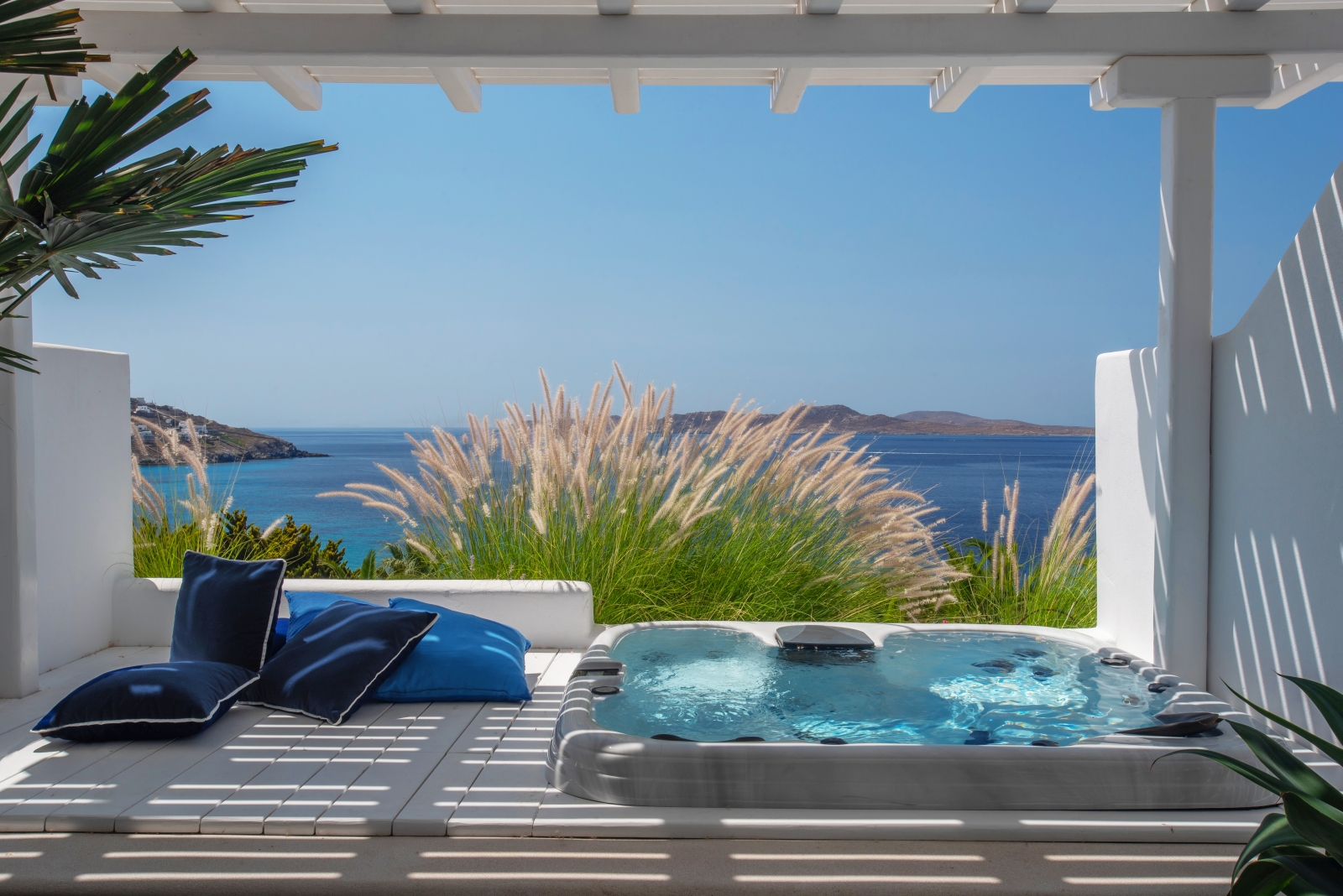 Hot tub outside a treatment room at Althea Spa at luxury resort Mykonos Grand, Greece
