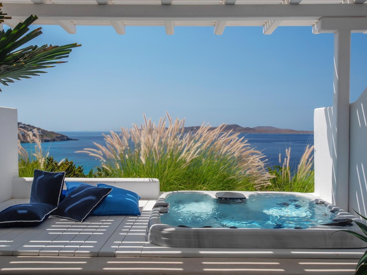 Hot tub outside a treatment room at Althea Spa at luxury resort Mykonos Grand, Greece