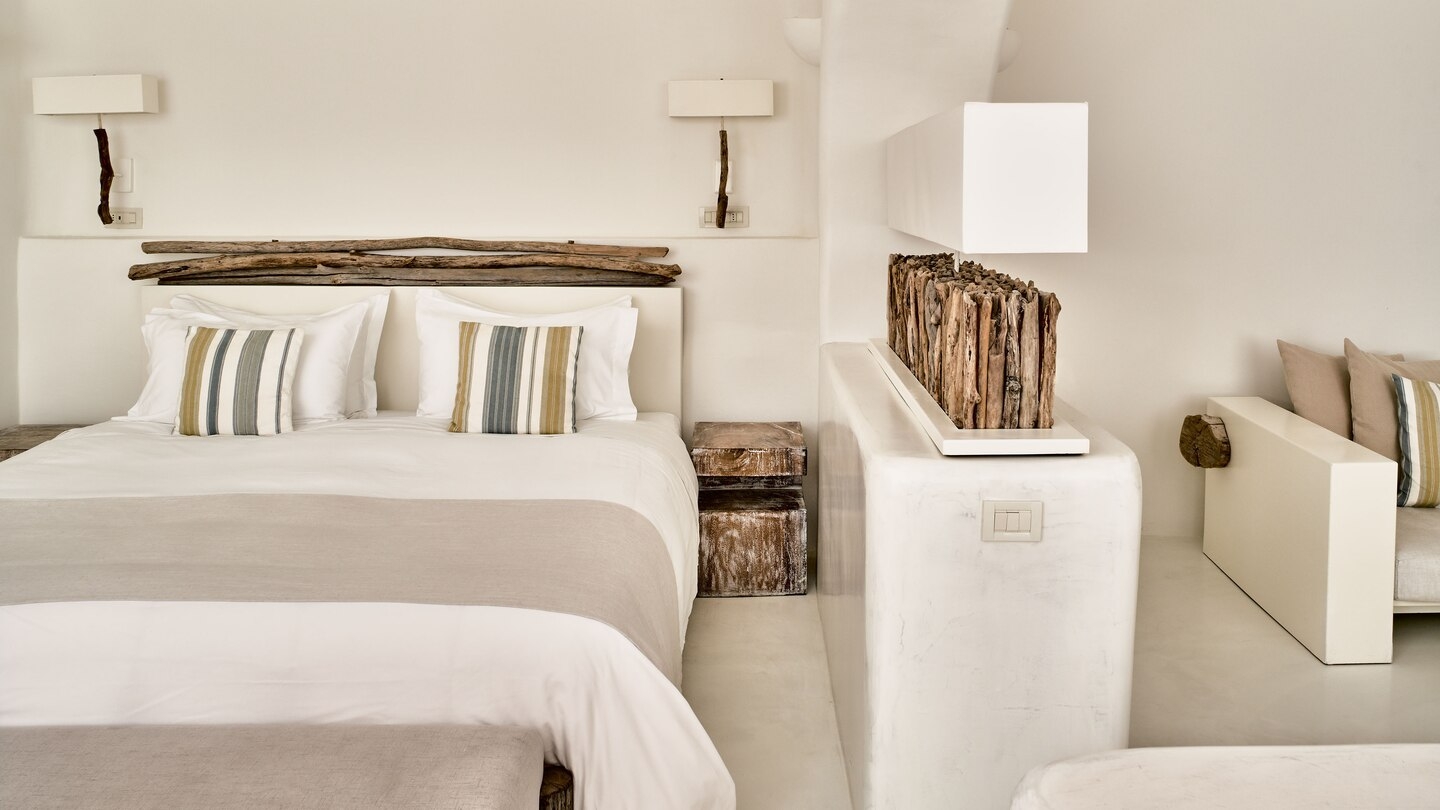 Spacious bedroom at Mystique in Santorini Greece