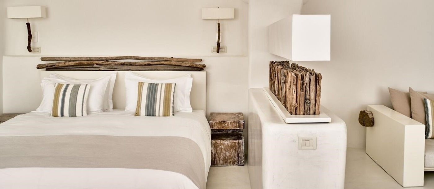 Spacious bedroom at Mystique in Santorini Greece