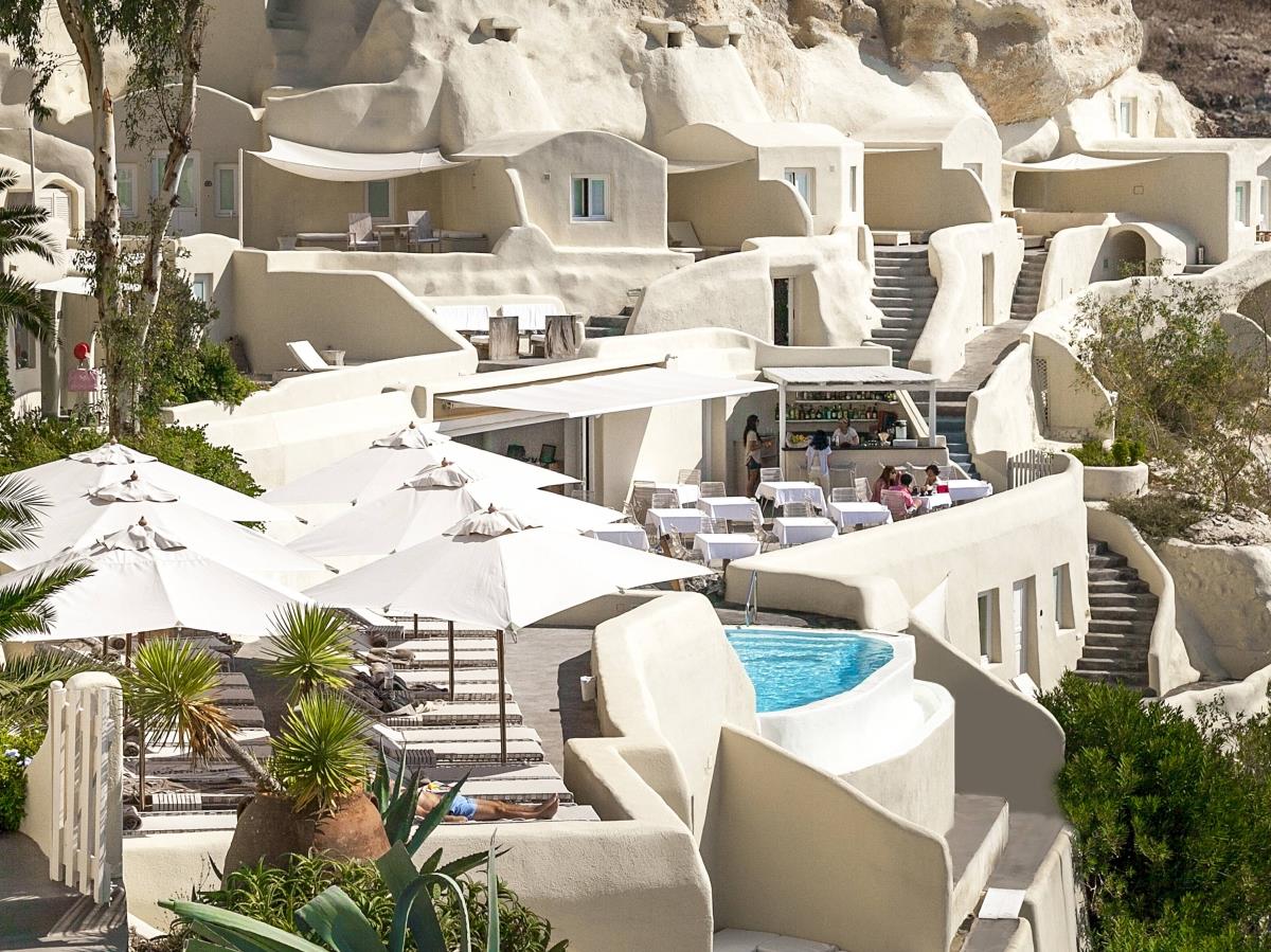 View over the restaurant and pool at Mystique in Santorini Greece