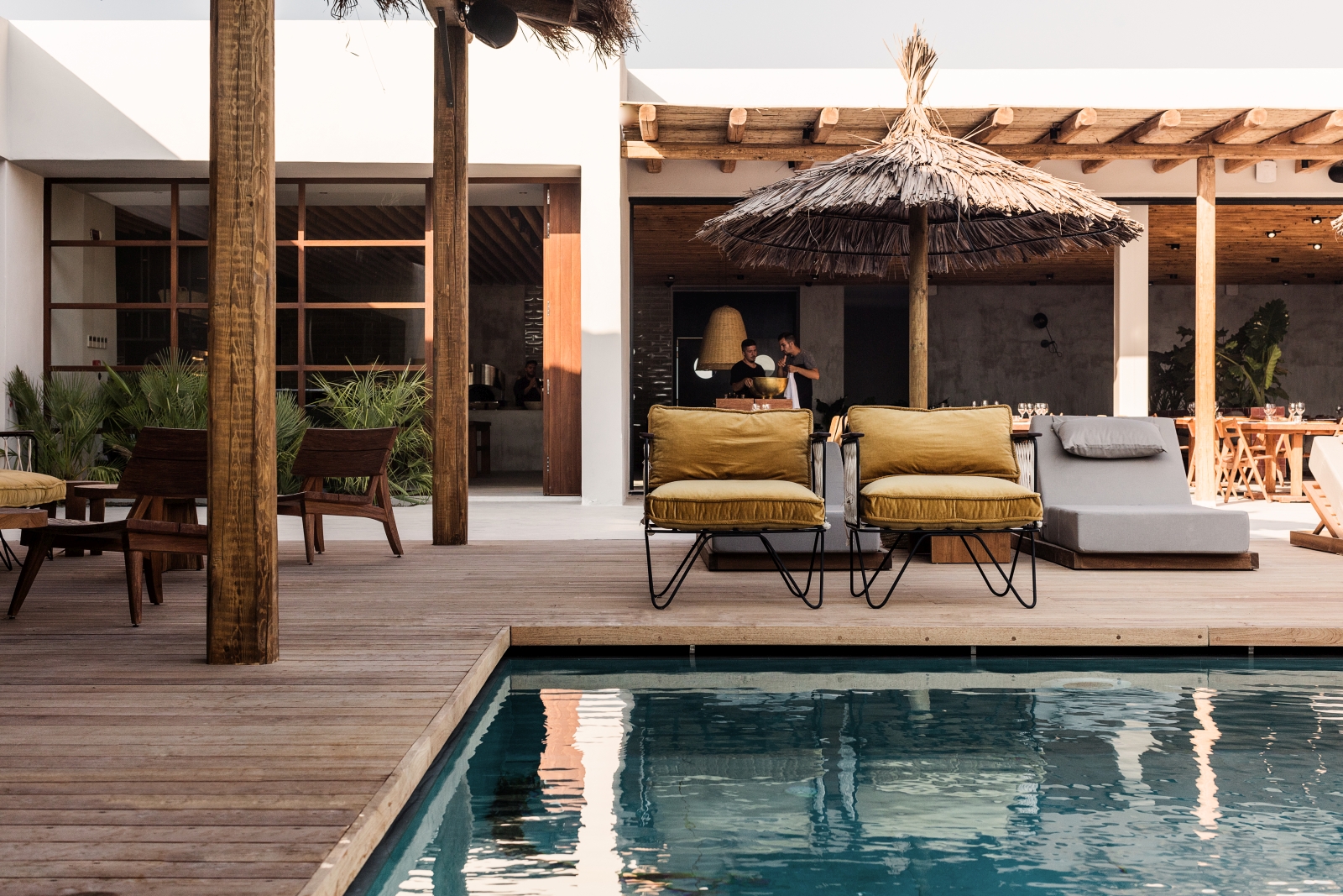 Seating and loungers by the pool at luxury hotel OKU Kos in Greece