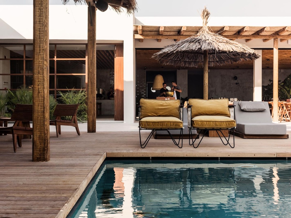 Seating and loungers by the pool at luxury hotel OKU Kos in Greece