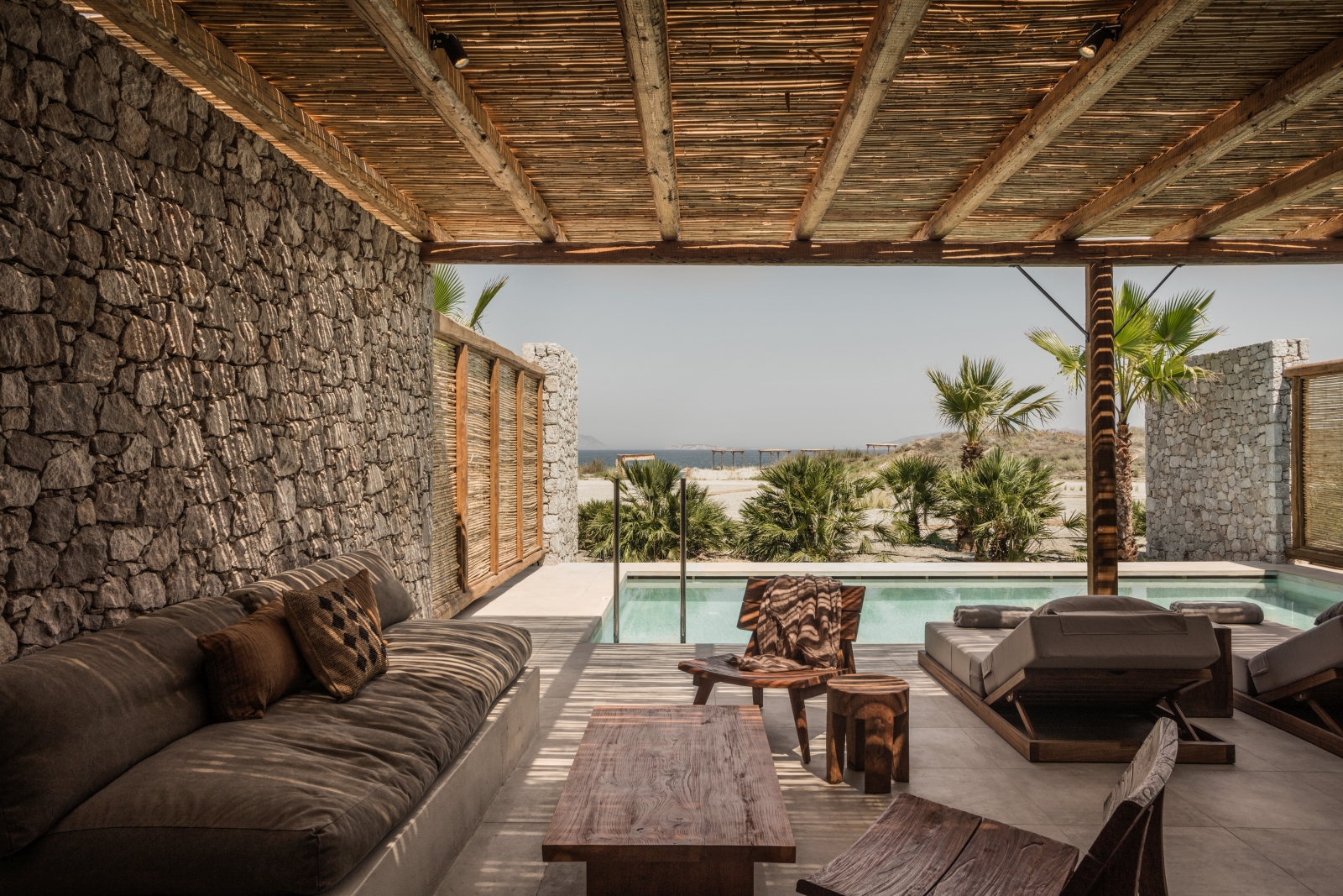Private pool and outdoor chillout area of a suite at luxury hotel OKU Kos in Greece