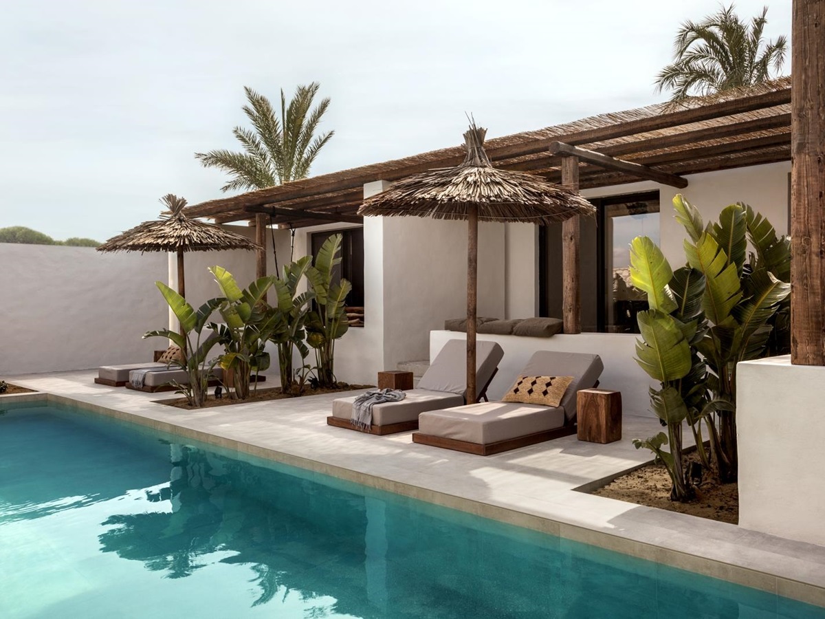 Loungers along the shared pool at luxury hotel OKU Kos in Greece