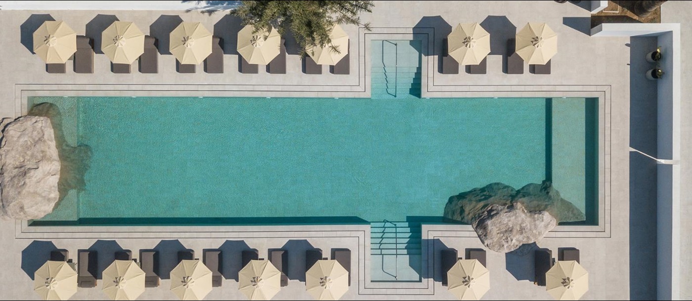 The swimming pool and terrace at Parilio Hotel Paros