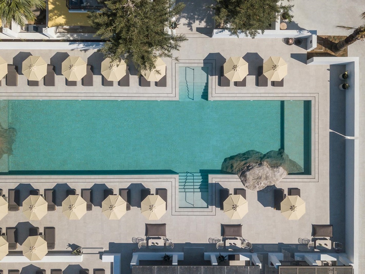 The swimming pool and terrace at Parilio Hotel Paros