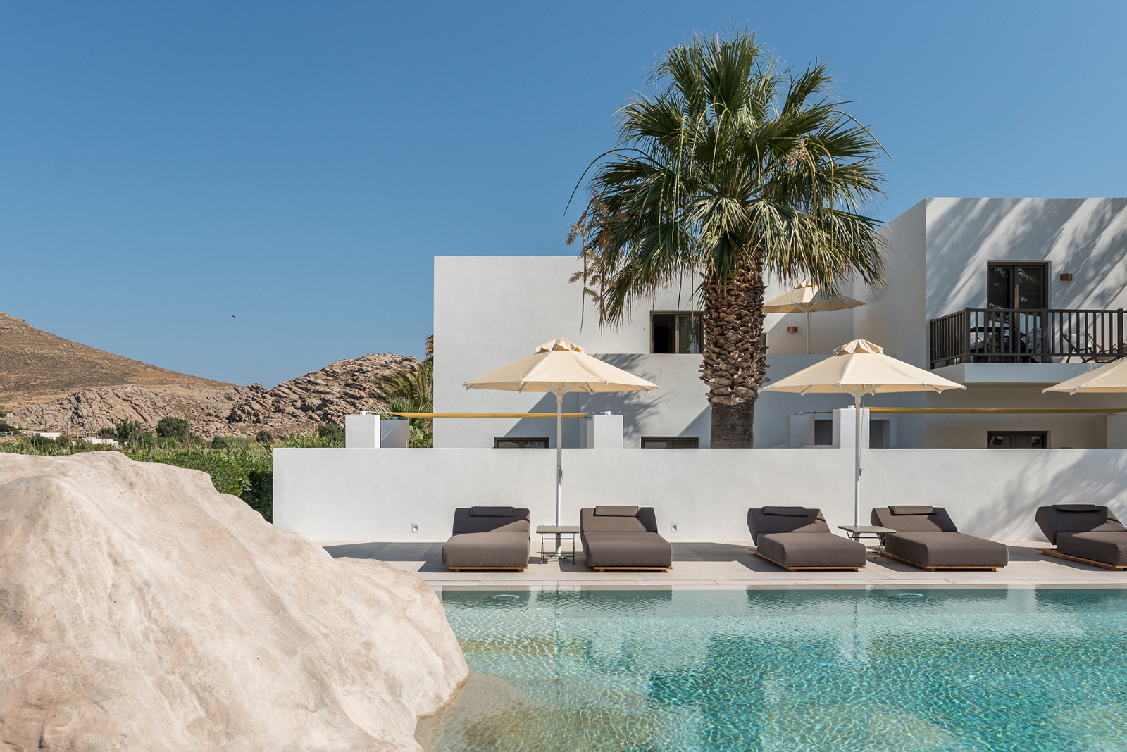 Swimming pool and terrace at Parilio Hotel Paros