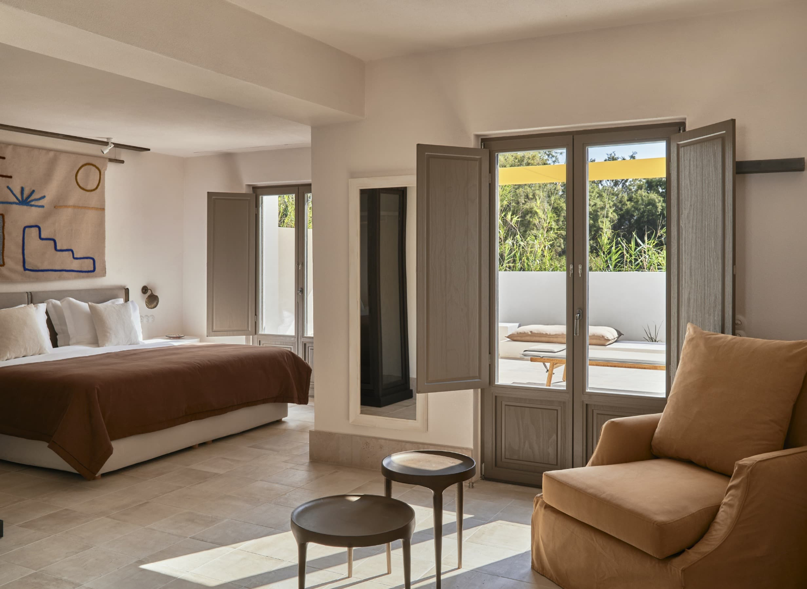 Understated design of a suite at Parilio Hotel Paros