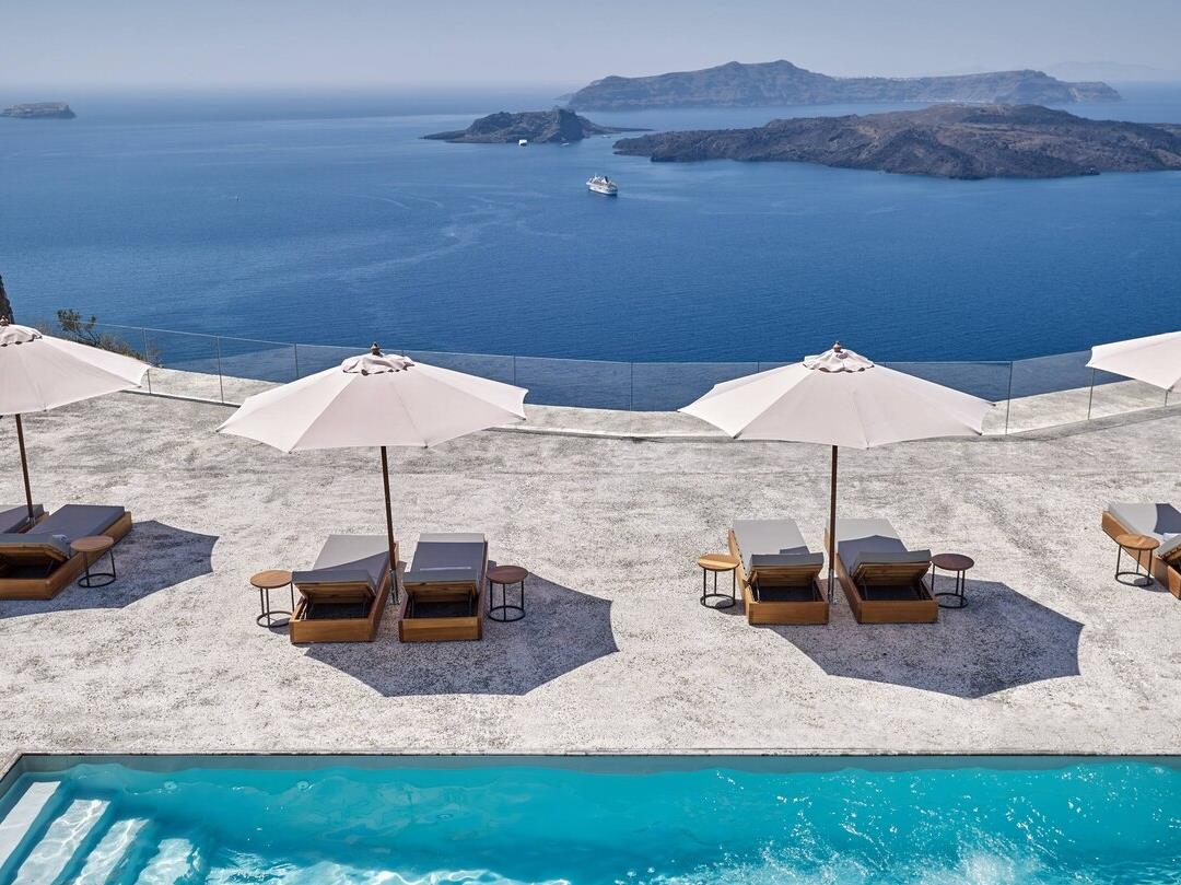 Loungers with sea view at Vedema Santorini Greece