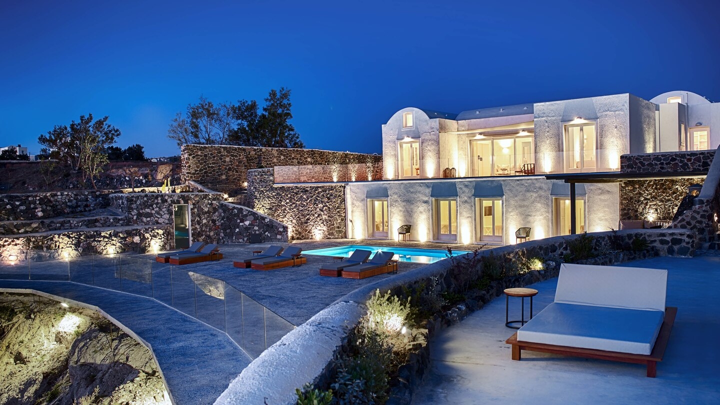 Pool at night at Vedema Santorini Greece