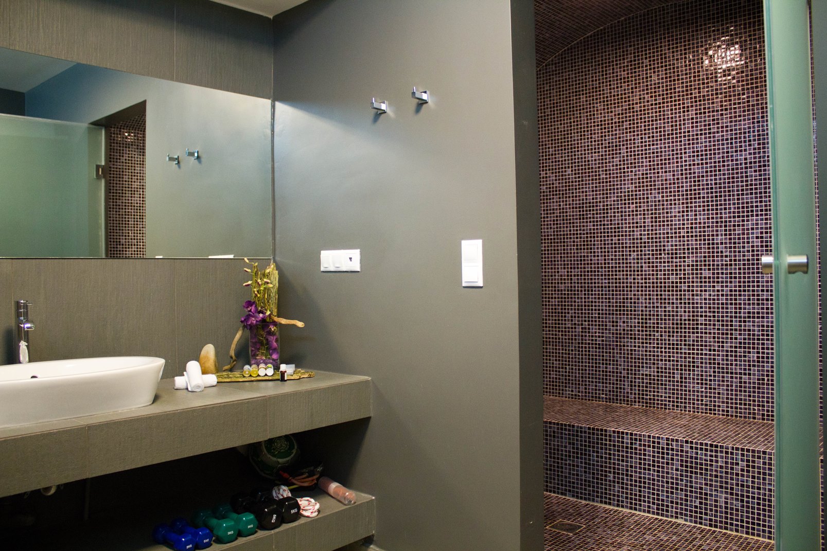 Bathroom with walk-in shower at Almyra Residence