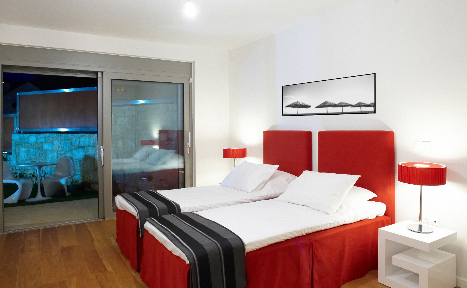 Twin bedroom and outdoor area at Almyra Residence