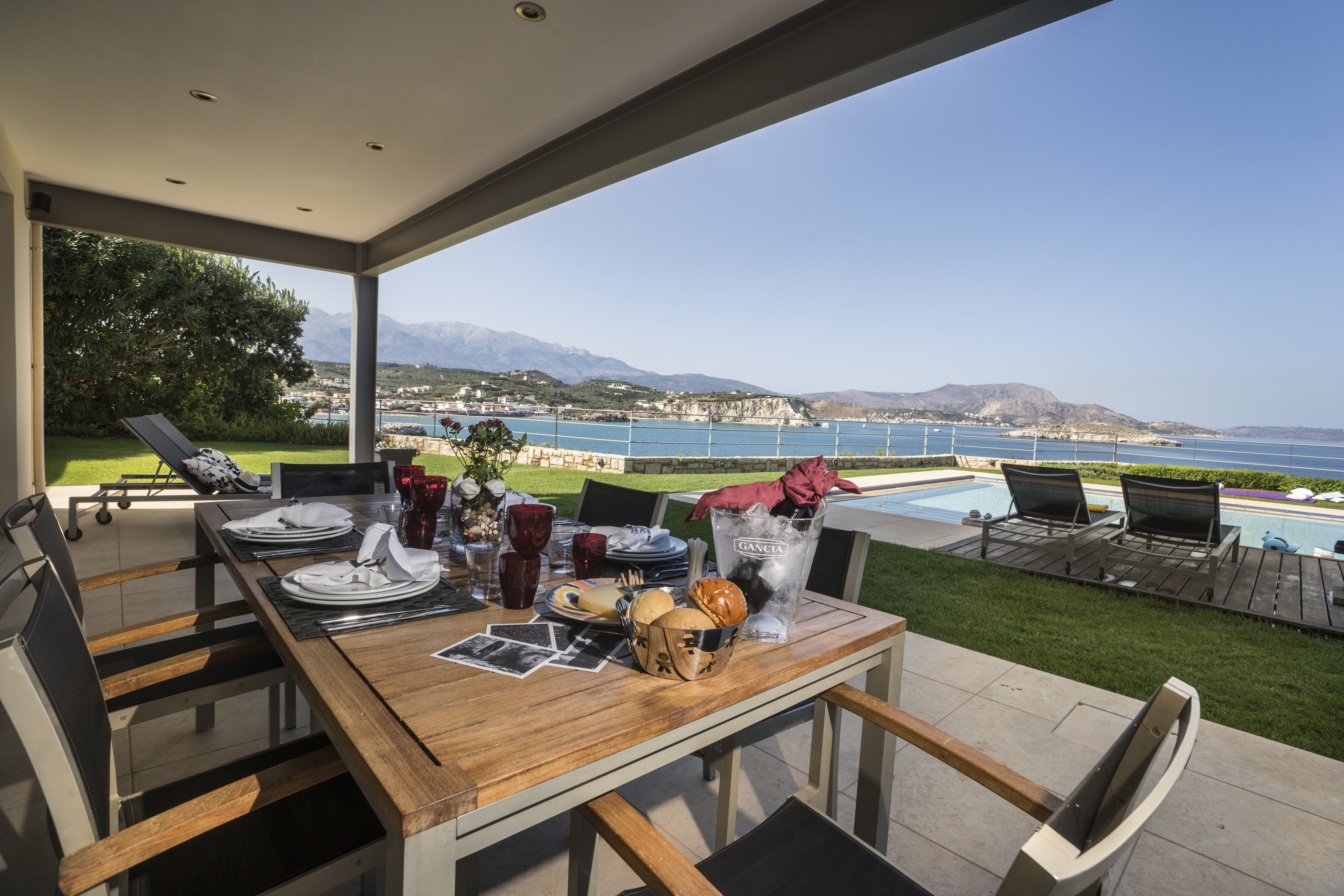 Outdoor dining at Almyra Residence