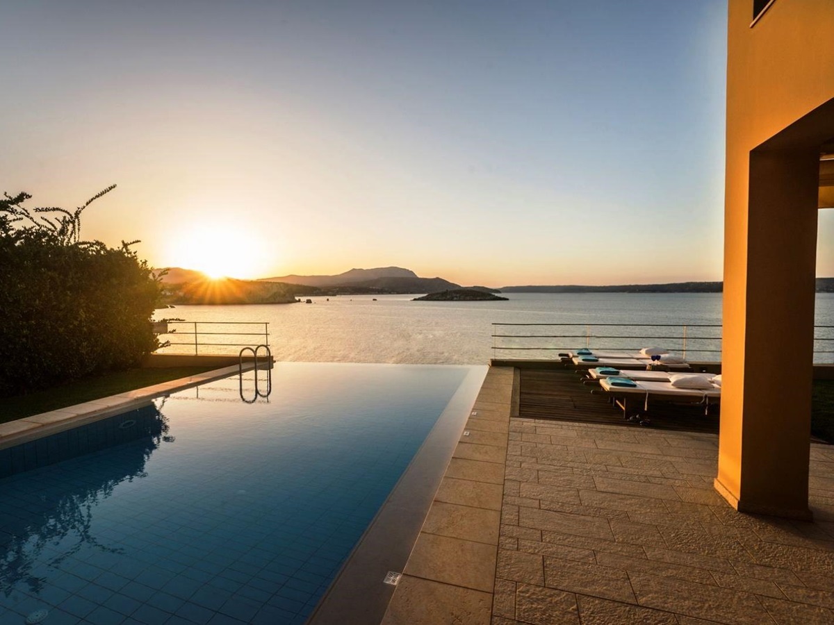 Swimming pool overlooking sea at villa anemos in crete