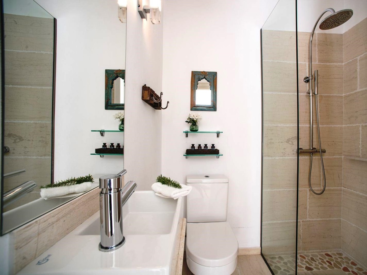 Bathroom with walk in shower, sink and wc at villa apraos in corfu, Greece