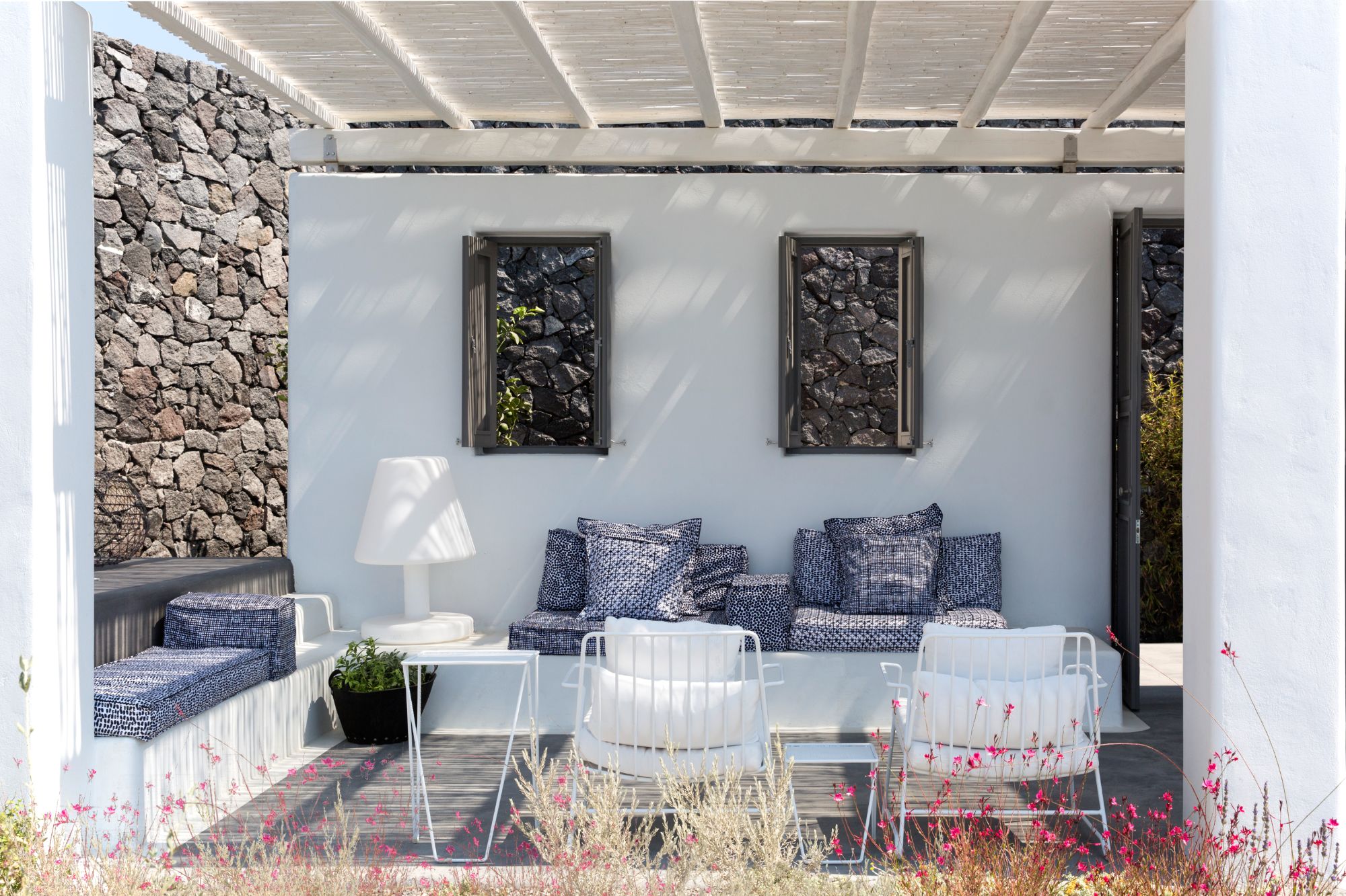 Outdoor seating area at Erosantorini