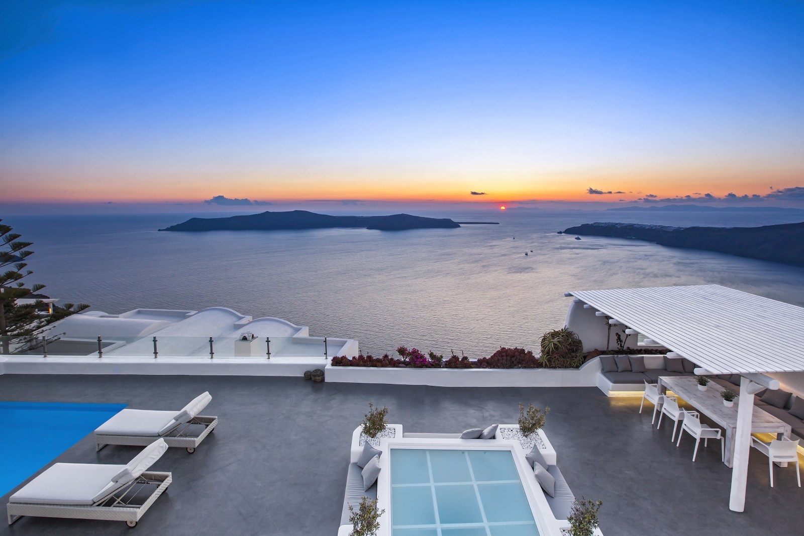 Outdoor area with sunset sea view at Erossea on Santorini, Greece