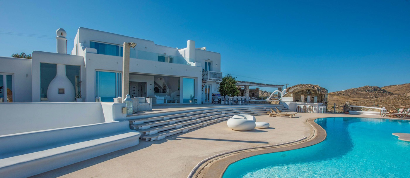 The facade and swimming pool of Kalafati Estate, Greece