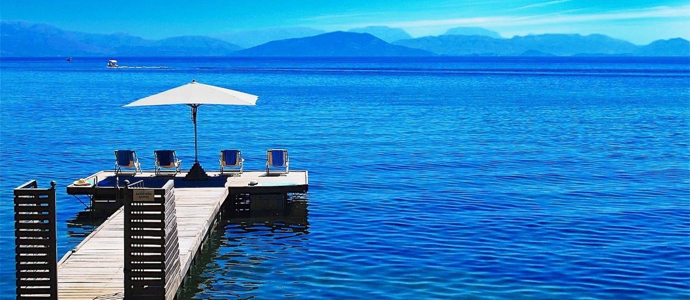 Wooden jetty at Kanoni Estate, a luxury villa in Corfu