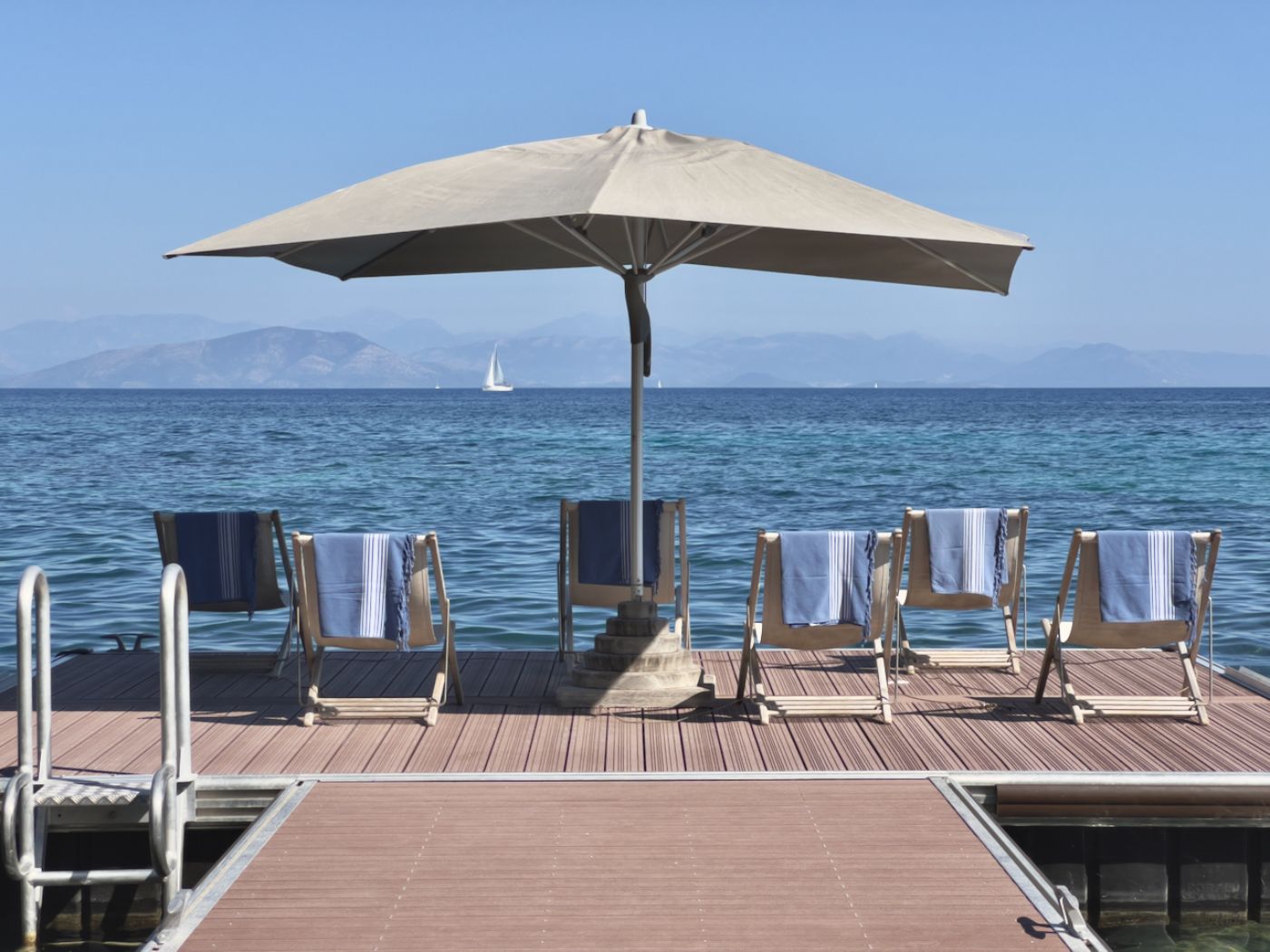 Jetty with sun loungers at Kanoni Estate