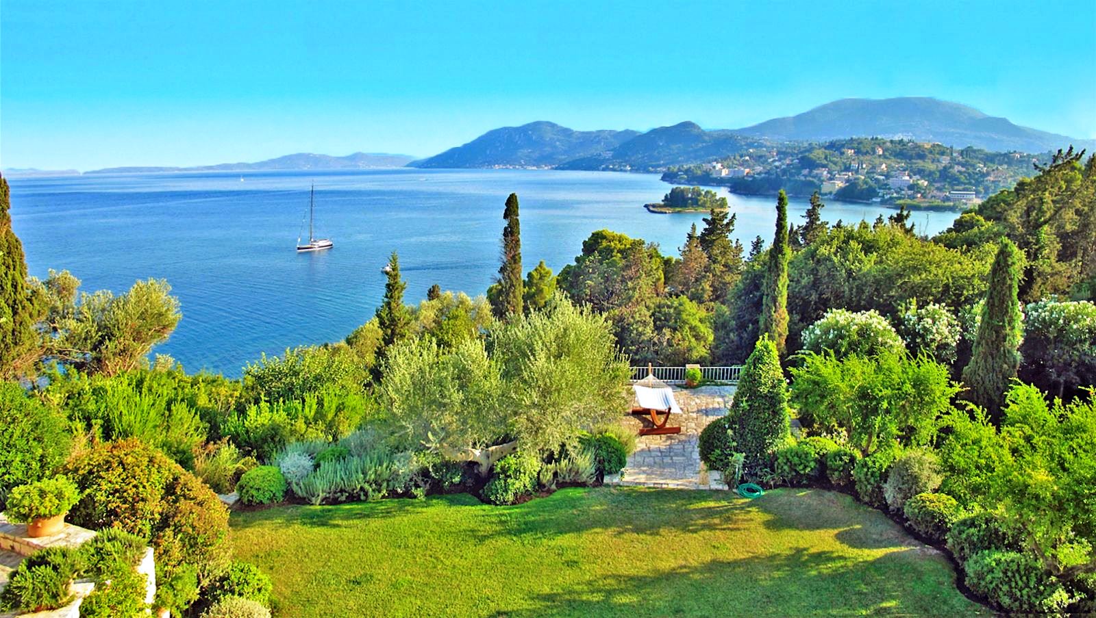 Panoramic view over the gardens at Kanoni Estate, a luxury villa in Corfu