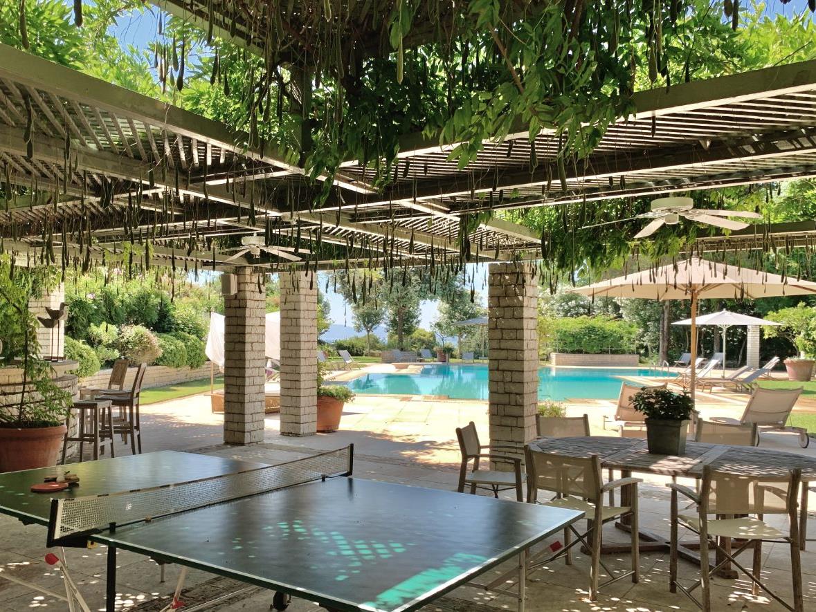 Table tennis and pool area at Kanoni Estate