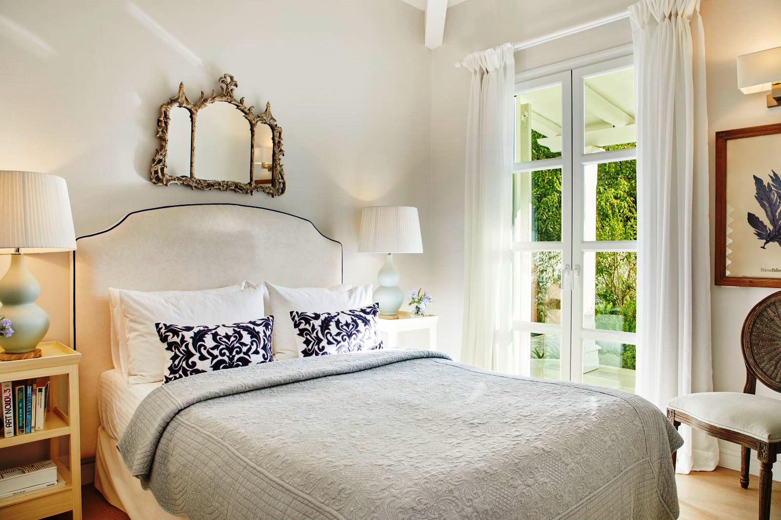 double bedroom with patio doors at kogevina beach villa in corfu, greece