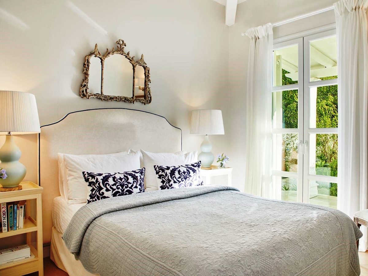 double bedroom with patio doors at kogevina beach villa in corfu, greece
