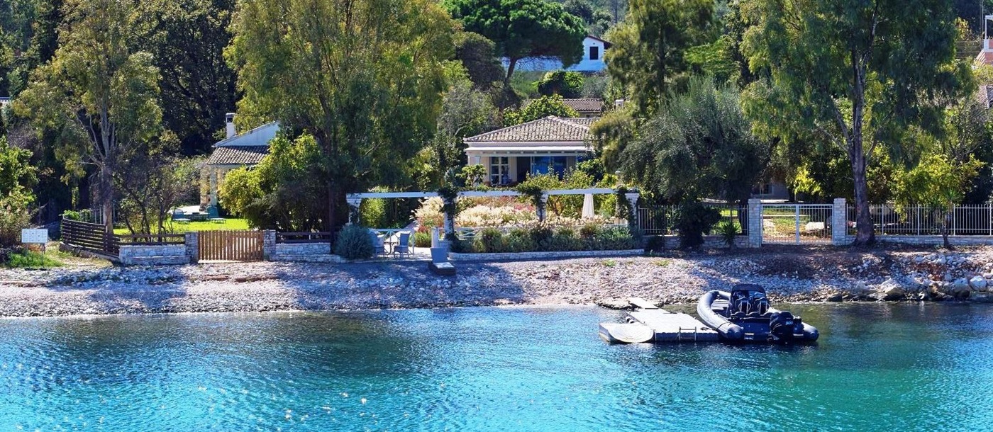 view from  sea of kogevina beach villa in corfu, greece