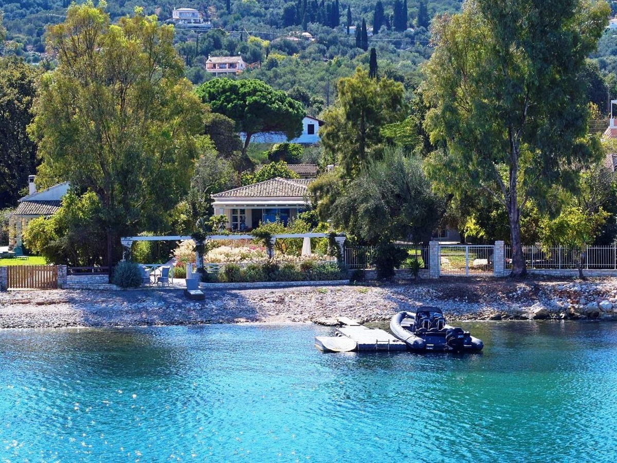 view from sea of kogevina beach villa in corfu, greece