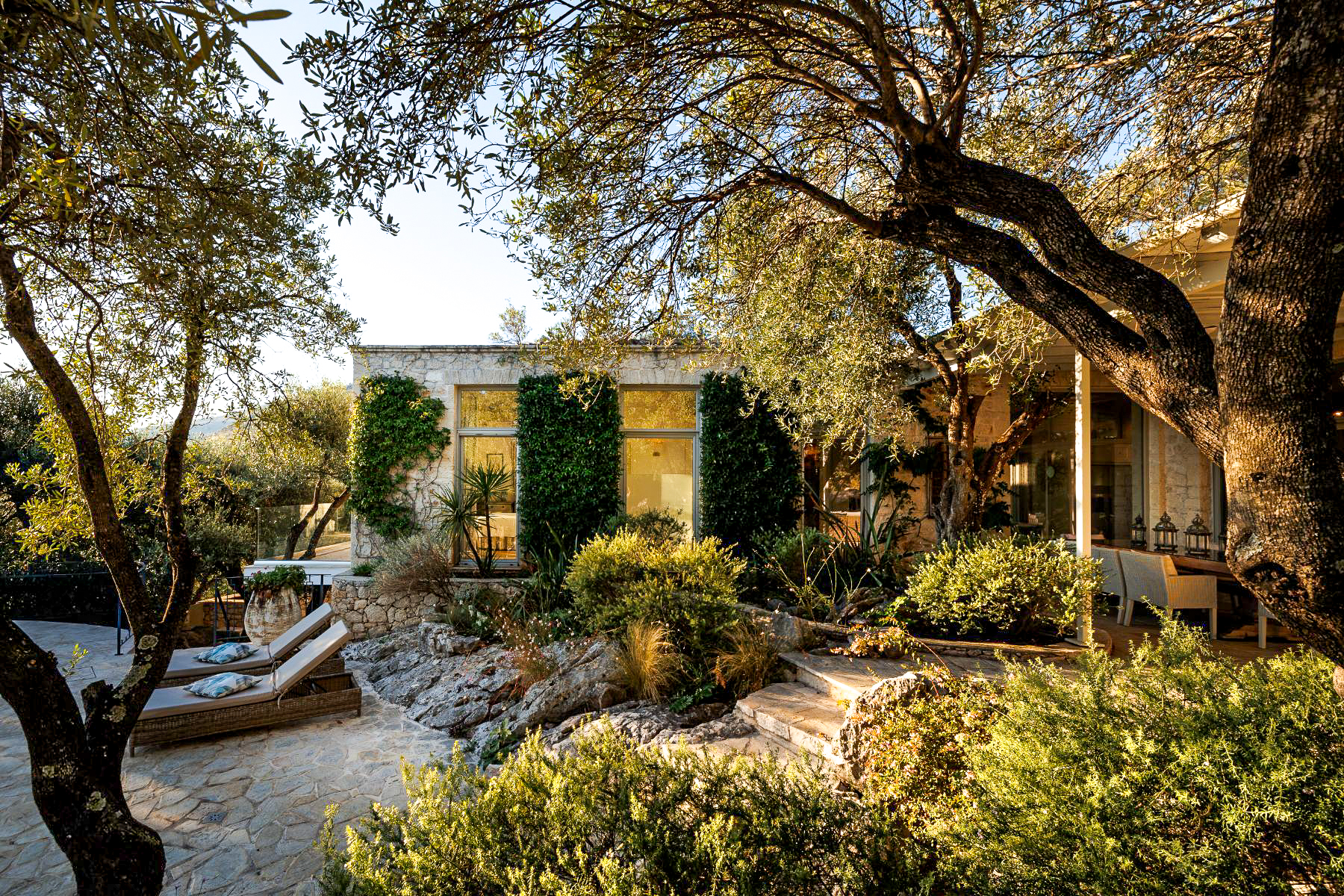 Terrace with sun loungers at Thinali, Corfu