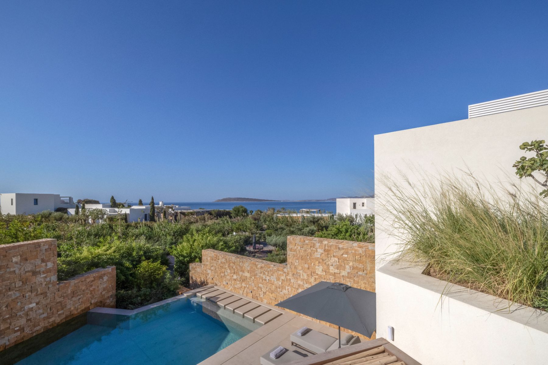 View of pool from balcony at Villa Amara, Paros
