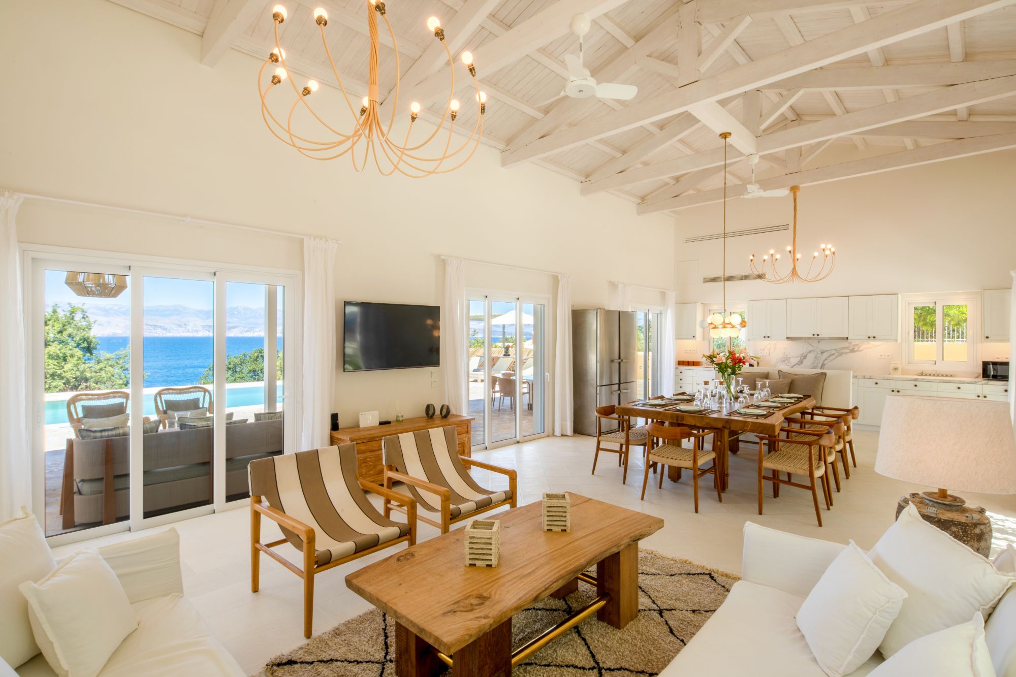 Living room with sea view at Villa Anthi