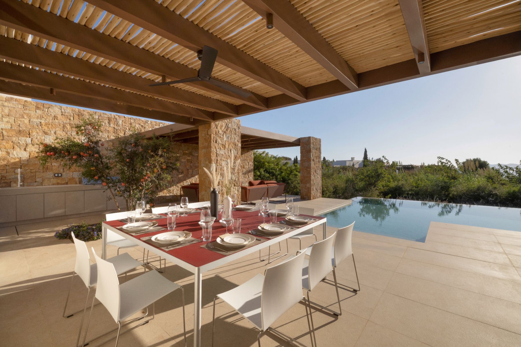 Covered outdoor dining terrace at Villa Aria, Paros