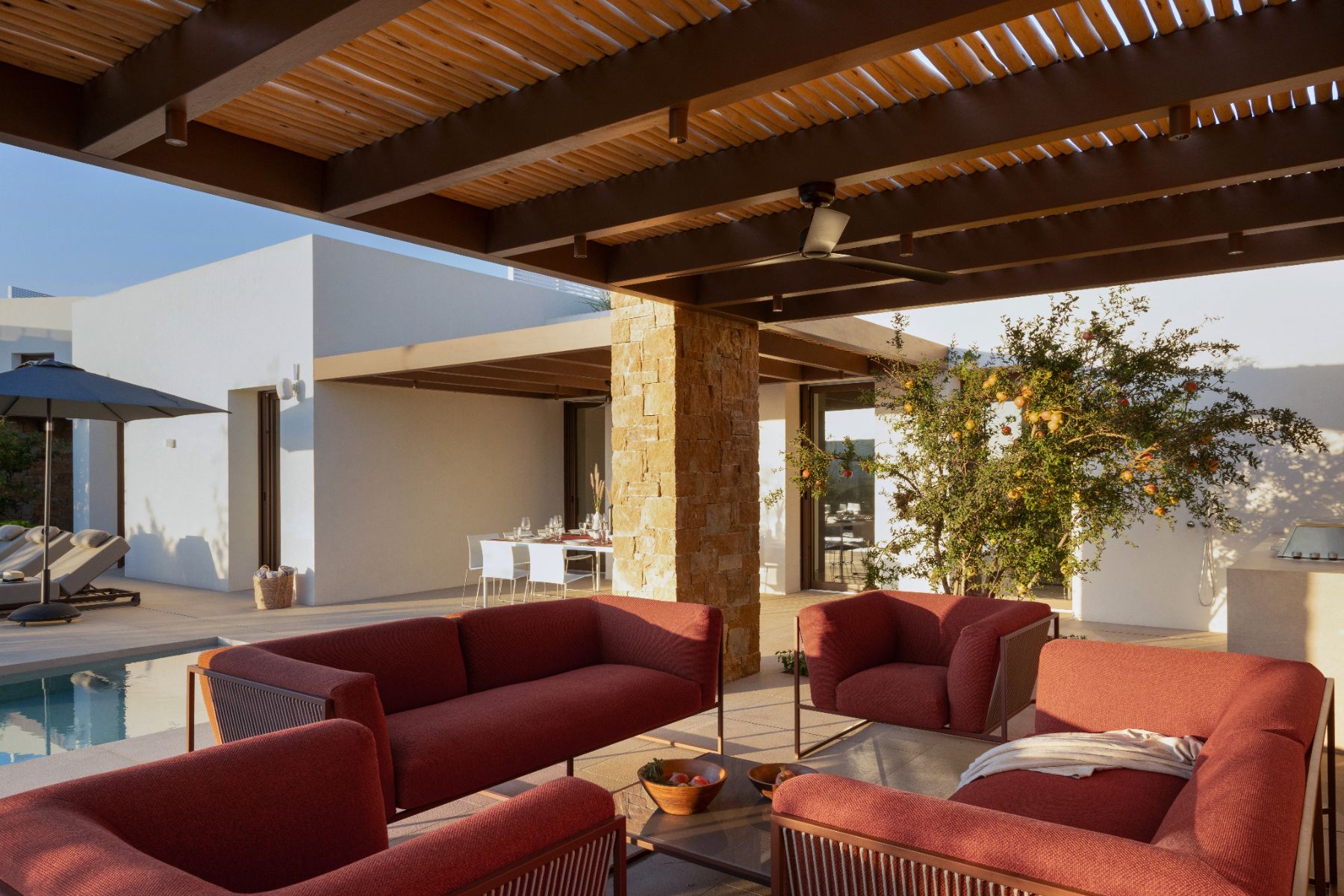 Covered terrace with seating at Villa Aria, Paros