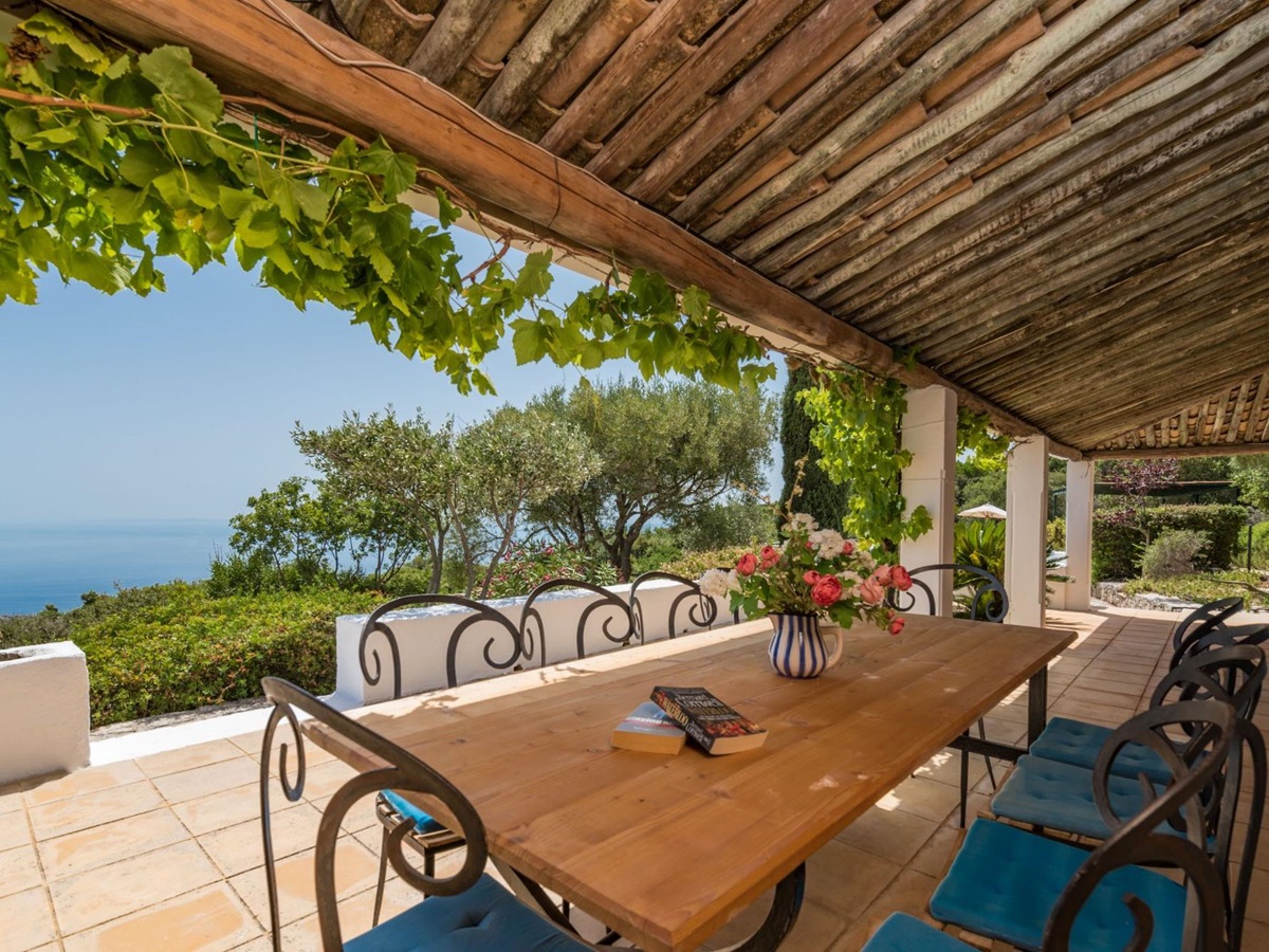 Outdoor dining area and terrace at Villa Ariane
