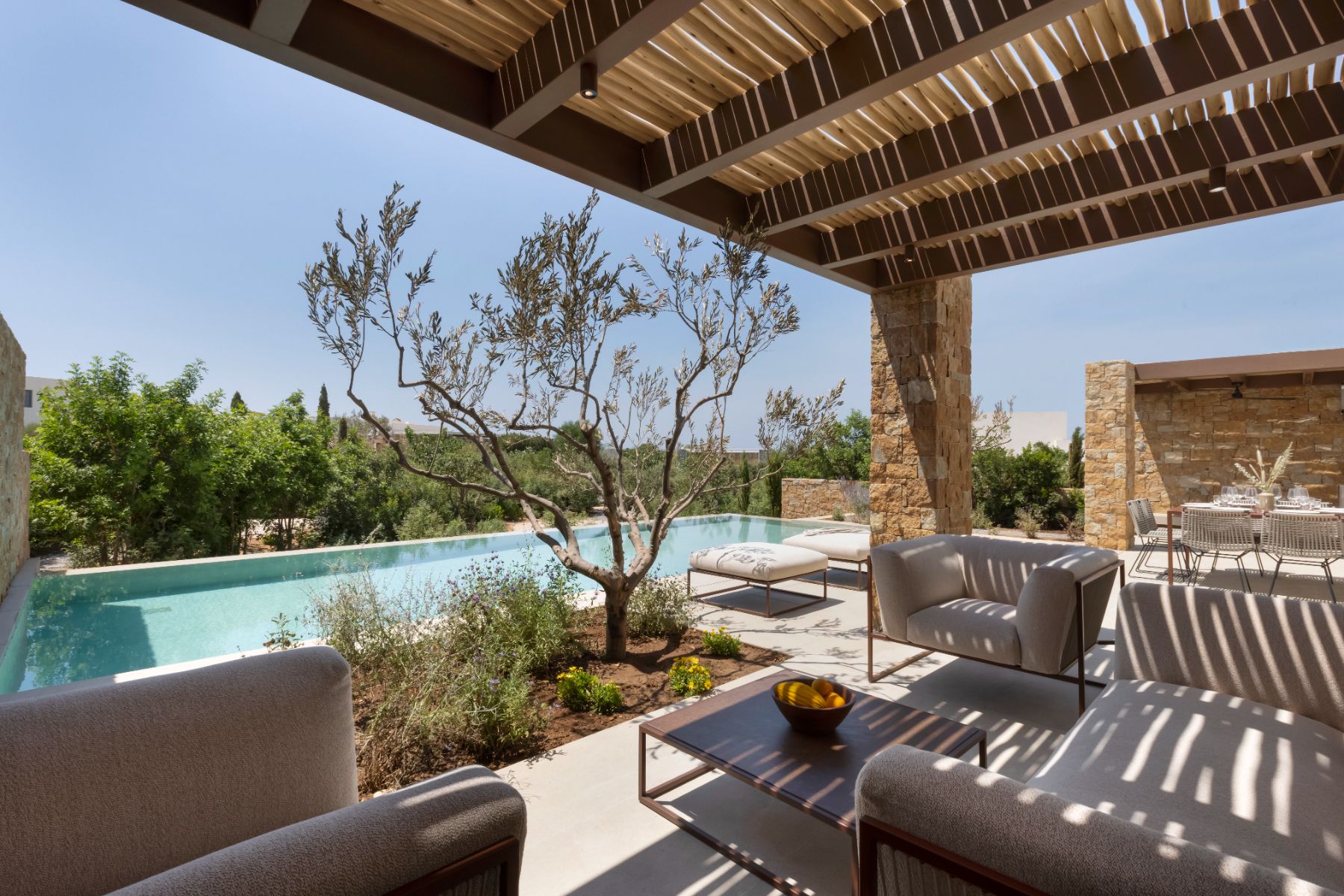 Covered outdoor seating at Villa Astra, Paros