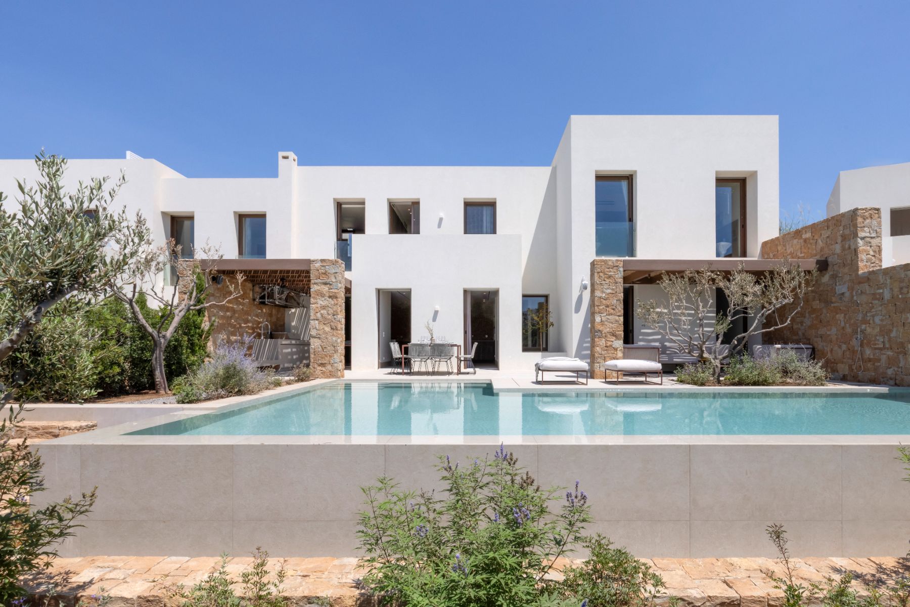 View of pool and exterior at Villa Astra, Paros