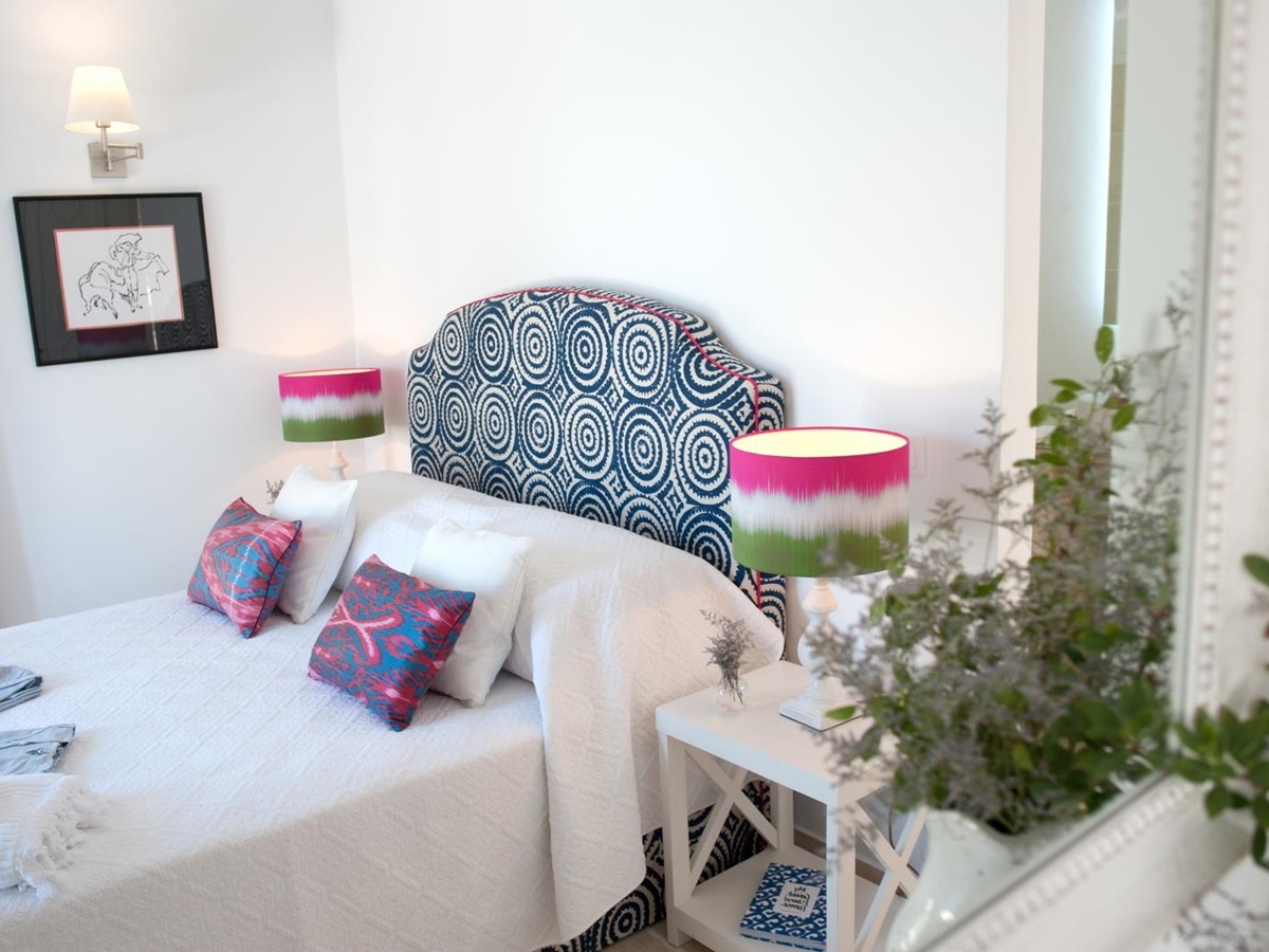 Double bedroom with blue patterned headboard at Villa Dionysos, Corfu