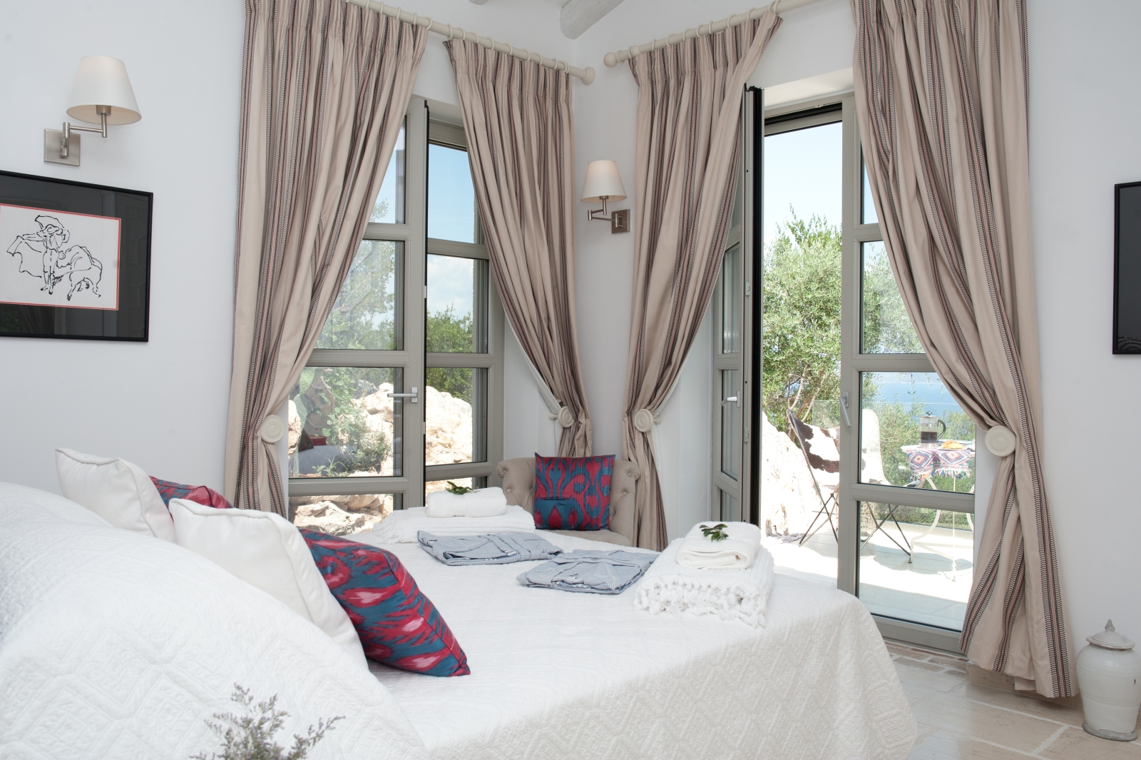 Double bedroom with view out onto sun terrace
