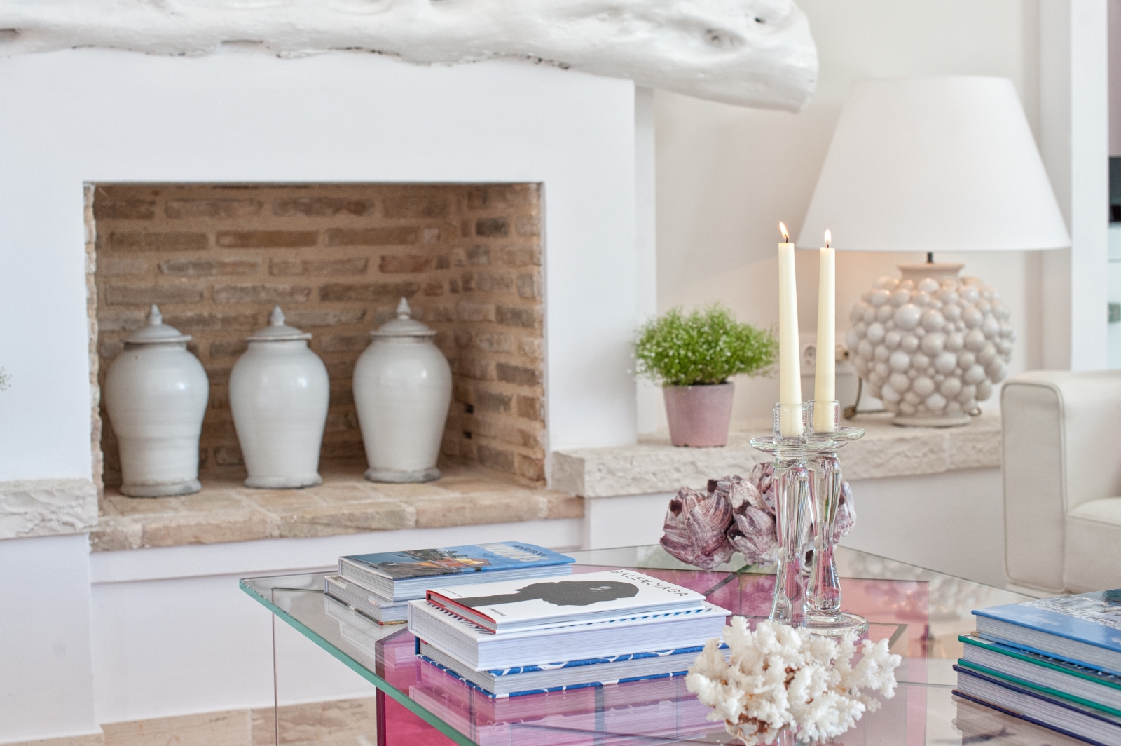 Living room bricked up fireplace and coffee table at Villa Dionysos, Corfu