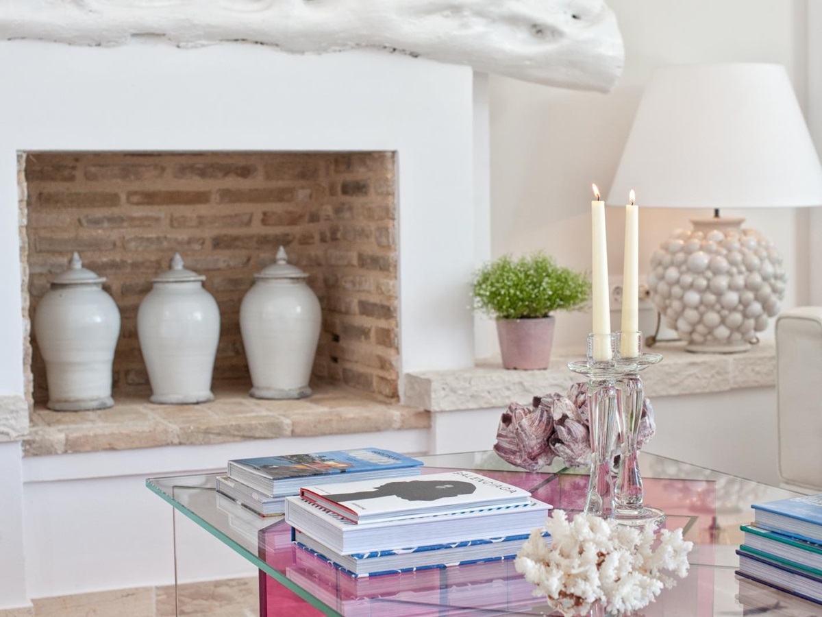 Living room bricked up fireplace and coffee table at Villa Dionysos, Corfu