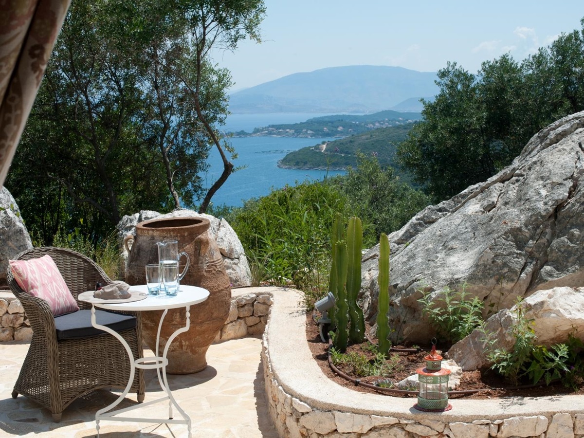 Secluded terrace seating with sea view at Villa Dionysos, Corfu