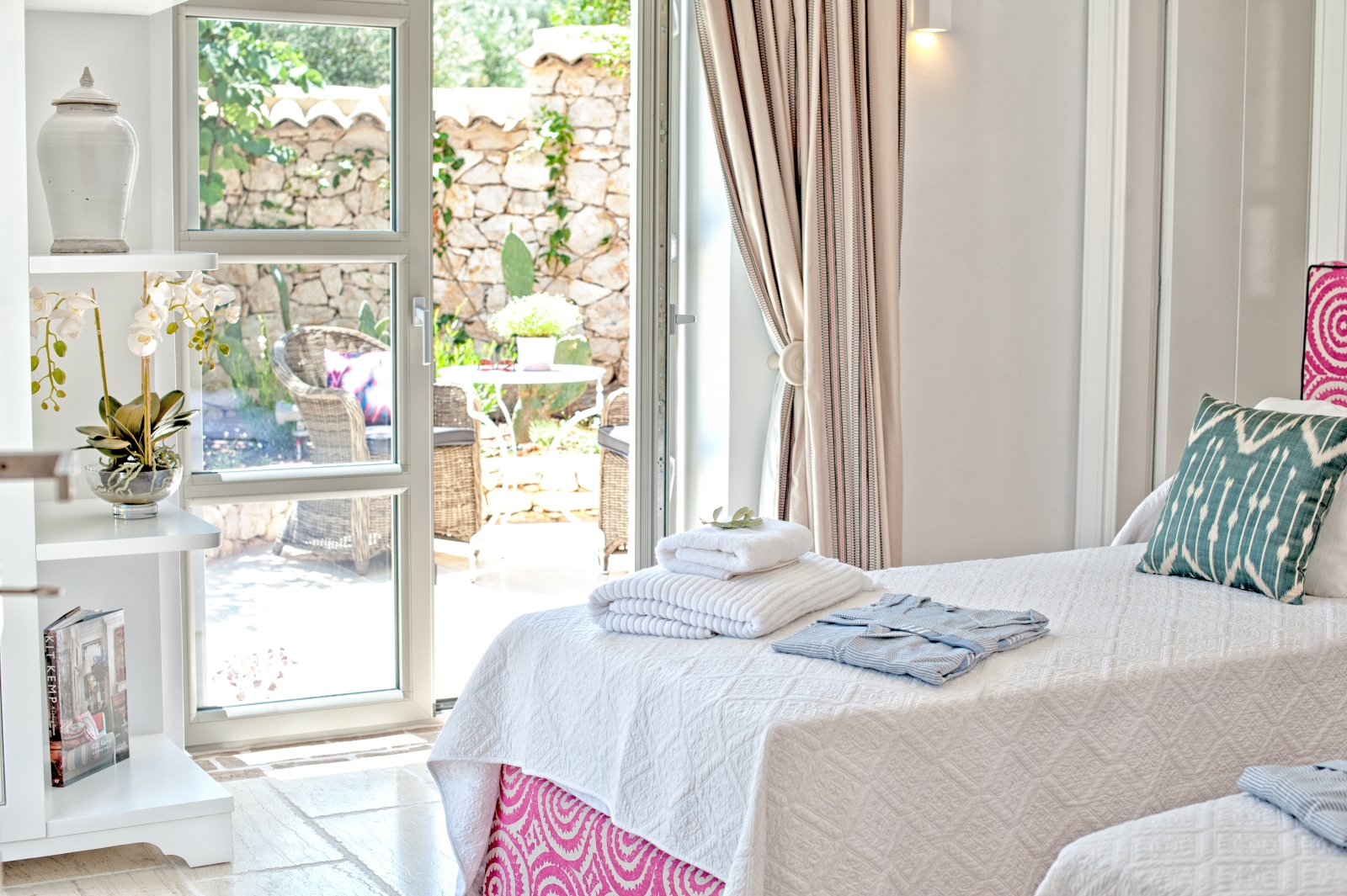 Twin bedroom with door onto terrace at Villa Dionysos, Corfu